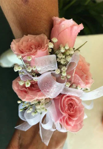 Pink miniature rose wrist corsage