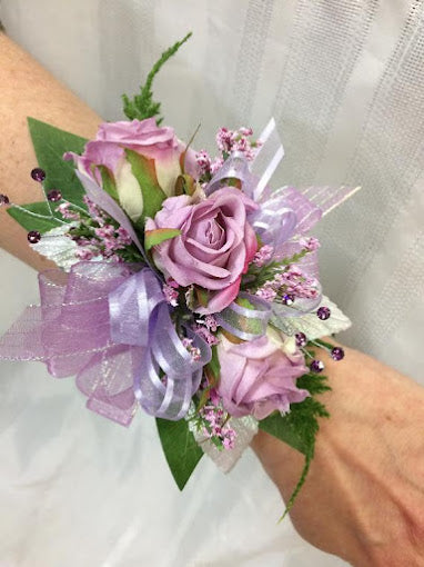 Lavender rose wrist corsage with accents