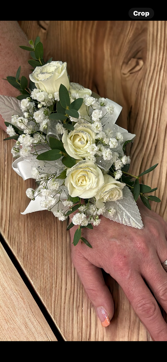 White miniature rose wrist corsage